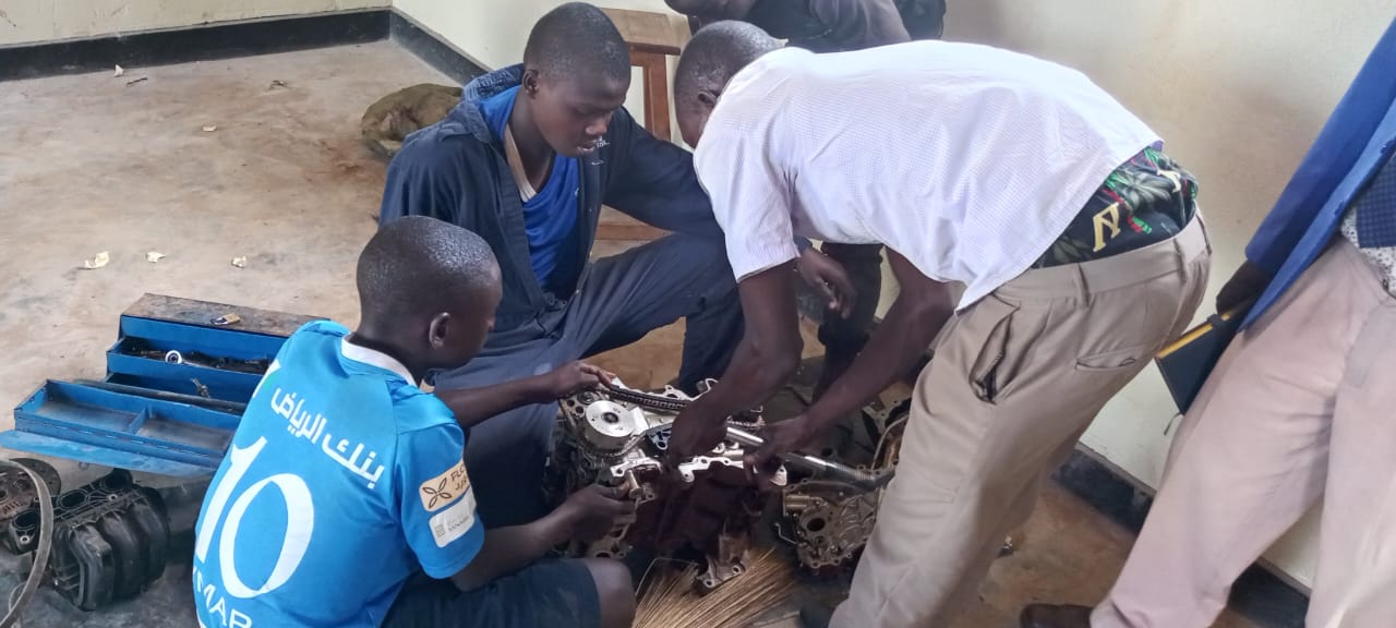 Practical Learning Mechanics Class At Allesandra Technical And Vocational School, Uganda